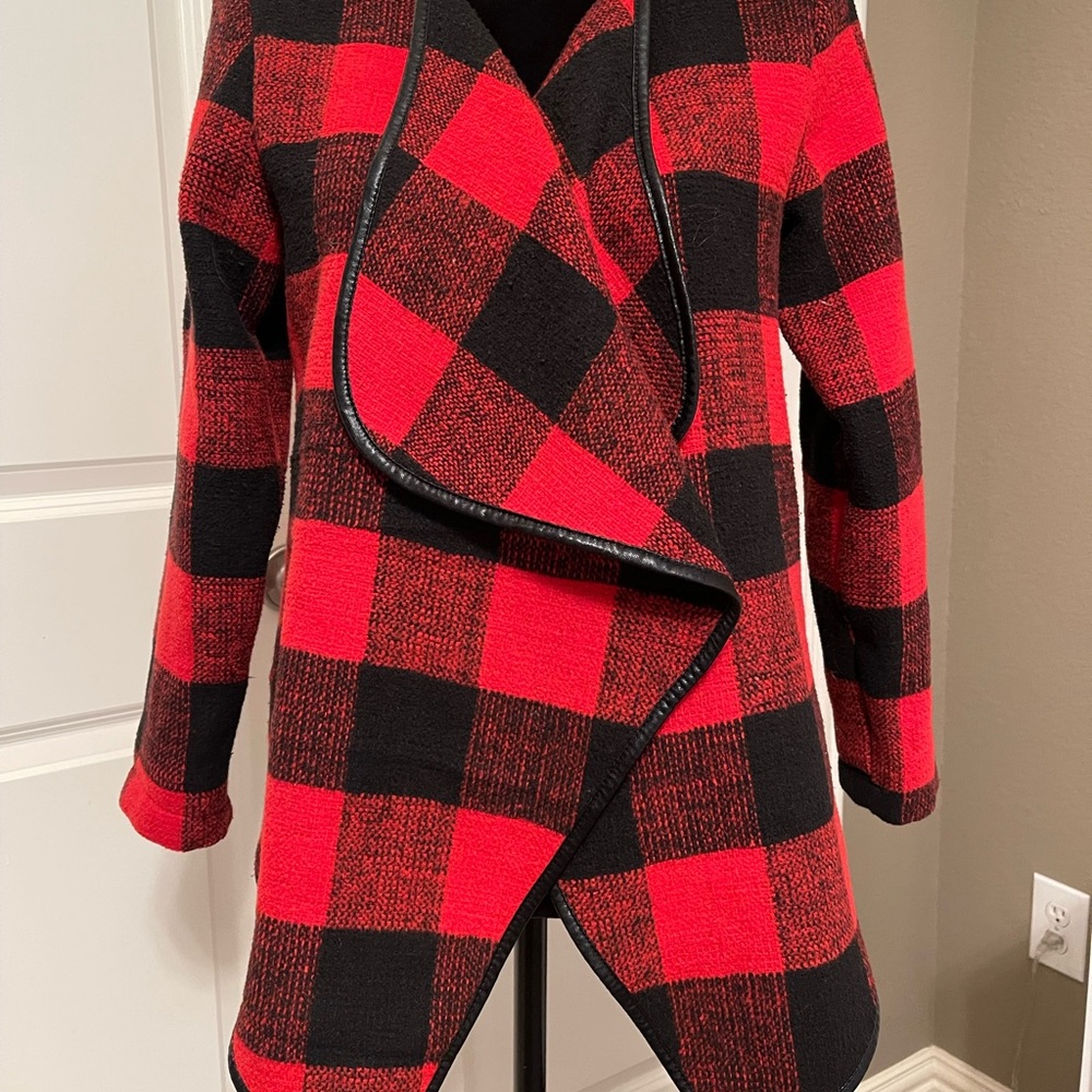 Beautiful red and black check jacket. Faux leather piping details. Size medium.